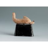 Dolphin. Smyrna, 3rd century BC.Terracotta.Provenance: Smyrna, 1895-1905. Collection Paul Gaudin (