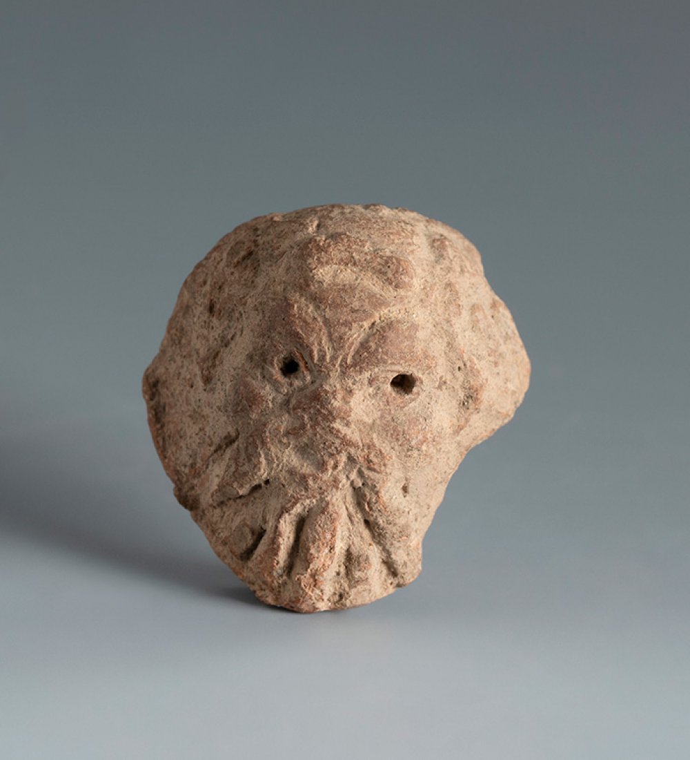 Head of Silenus. Smyrna, 3rd century BC.Terracotta.Provenance: Smyrna, 1895-1905. Collection Paul