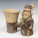 Cylindrical kero; Chankay culture, Peru, c. 1000-1200 AD.Polychrome terracotta.The ocarina has