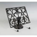 Table reading stand, second half of the 20th century.Fretworked and patinated iron.Measurements: