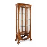 Modernist display cabinet, circa 1900.Walnut wood and glass. Interior supports and handles in gilt