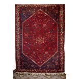 Shiraz carpet, Iran, ca. 1940.Wool warp and weft.Hand-woven.Size: 305 x 204 cm .Persian rug with a