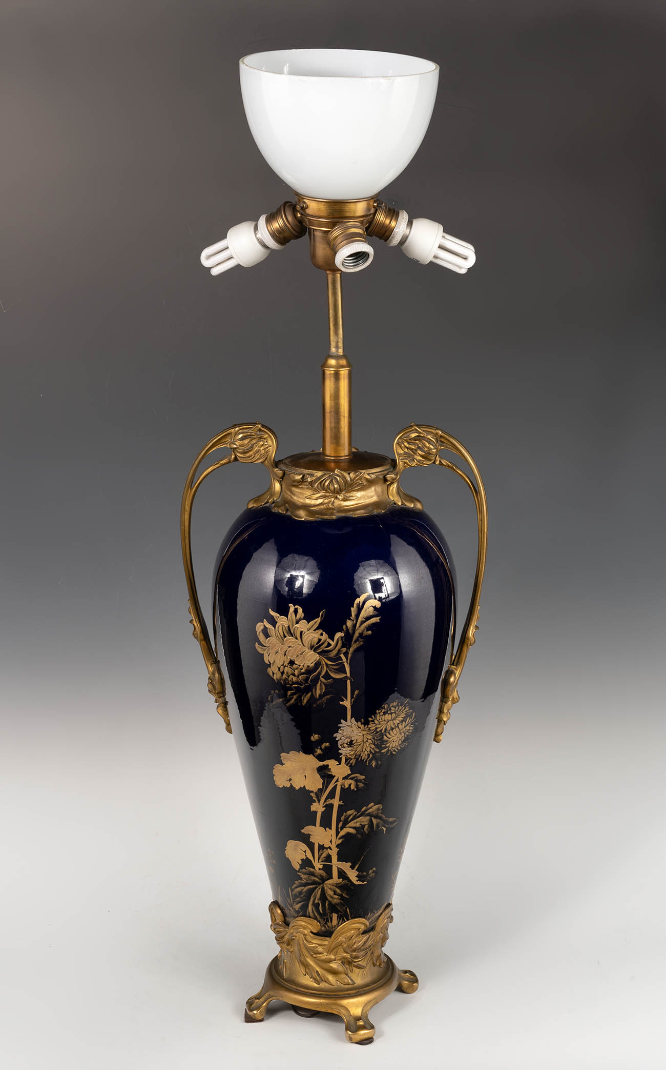 Art Nouveau vase transformed into a lamp stand, France, 20th century.Cobalt blue porcelain painted