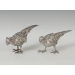 Pair of birds. Mid-twentieth century. In silver.Weight: 1.350 kg.Measurements: 13 x 33 x 9 cm.Pair