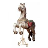 Rocking horse. Europe, late 19th century.Polychrome wooden structure.Measurements: 127 x 110 x 32