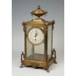 Showcase clock; Napoleon III period; Last third of the 19th century.Bronze and glass.Measurements: