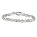 Riviere bracelet in 18 carat white gold. Classic model articulated with brilliant-cut diamonds