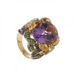 Ring in 18kt yellow gold. Cocktail model with central oval-cut amethyst weighing ca. 16 carats.