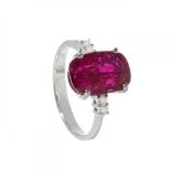 Ring in 18kt white gold. Model with natural oval-cut ruby weighing ca. 3.92 cts. and diamonds
