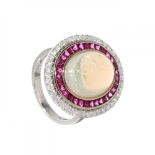 Ring in 18 carat white gold. Oval rosette model with white opal cabochon, weighing ca. 4.56