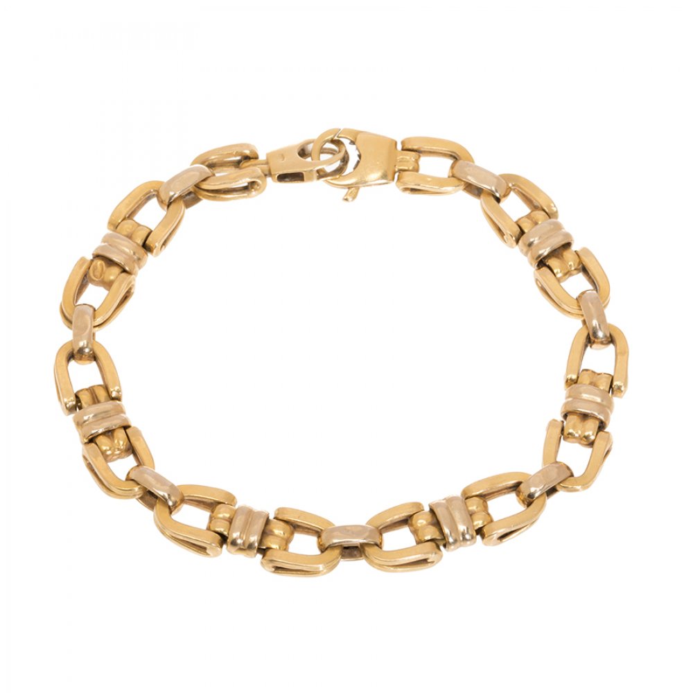 Bracelet in 18kt yellow gold. Model with articulated links joined by a double clamp. Italian