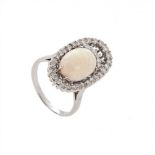 Ring made in 18 kt white gold. with a beautiful opaque cabochon size of 13 x 9 mm. High quality with