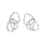 Pair of earrings 70-80s in 18k white gold. Frontis model double oval dotted with brilliants, H