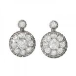 Pair of earrings in platinum. Rosette model with brilliant-cut diamonds weighing ca. 1.24 carats.