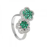 Ring in 18 kts. white gold. Model with double rosette with tsavorite garnets weighing ca. 0.51