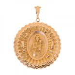 Delicately chiselled 12kt yellow gold medallion with an image of the Sacred Heart on the obverse and