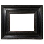 Dutch style frame; 17th century.Carved and ebonised wood.Damage caused by xylophages.It presents