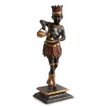 European school, 18th century.Black servant.In carved, polychrome and gilded wood.Part of a foot
