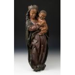 Spanish school; circa 1500."Virgin and Child".Carved and polychromed wood.It presents faults in
