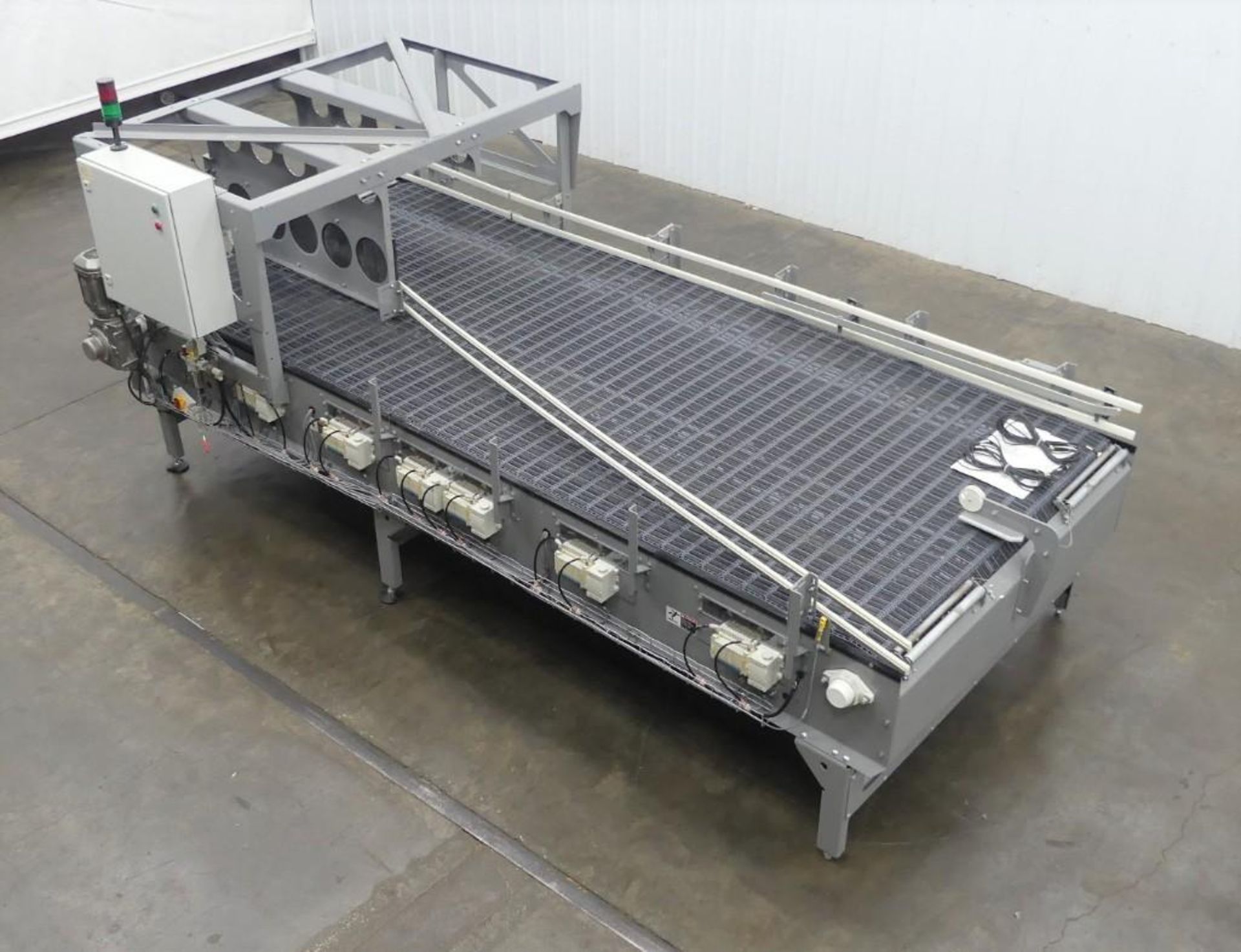 Intralox 12.5' L Activated Roller Belt Laning Conveyor