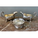 A Three Piece Silver Set of Two Sauceboats and a Loving Cup