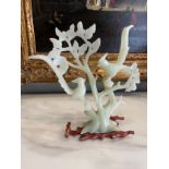 A Chinese (?) Jade Carving of Birds and Foilage on an Associated Wooden Stand