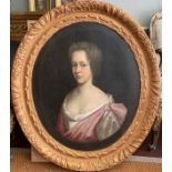 Property of a Gentleman An Oval Portrait of A Young Lady, British, 18th century. In a carved and