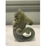 An Antique Chinese Jade Horn with a Climbing Dragon