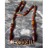 A Tibetan Dzi Bead and Agate Necklace - Dzi Bead with 15 Eyes