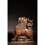 A Large Antique Wooden Carving of a Lion