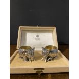 A pair of Russian silver salts modelled as elephants, bearing hall marks of Faberge