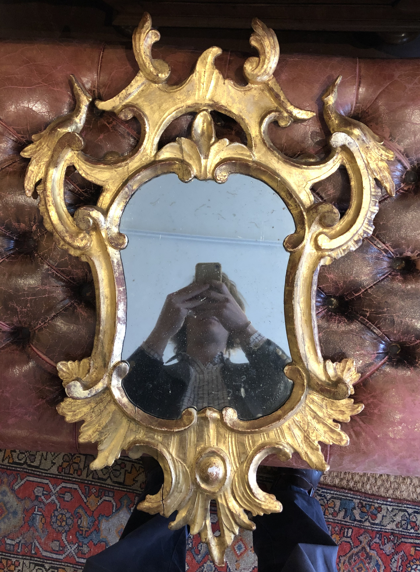 18th/19th Century, A carved and gilded mirror