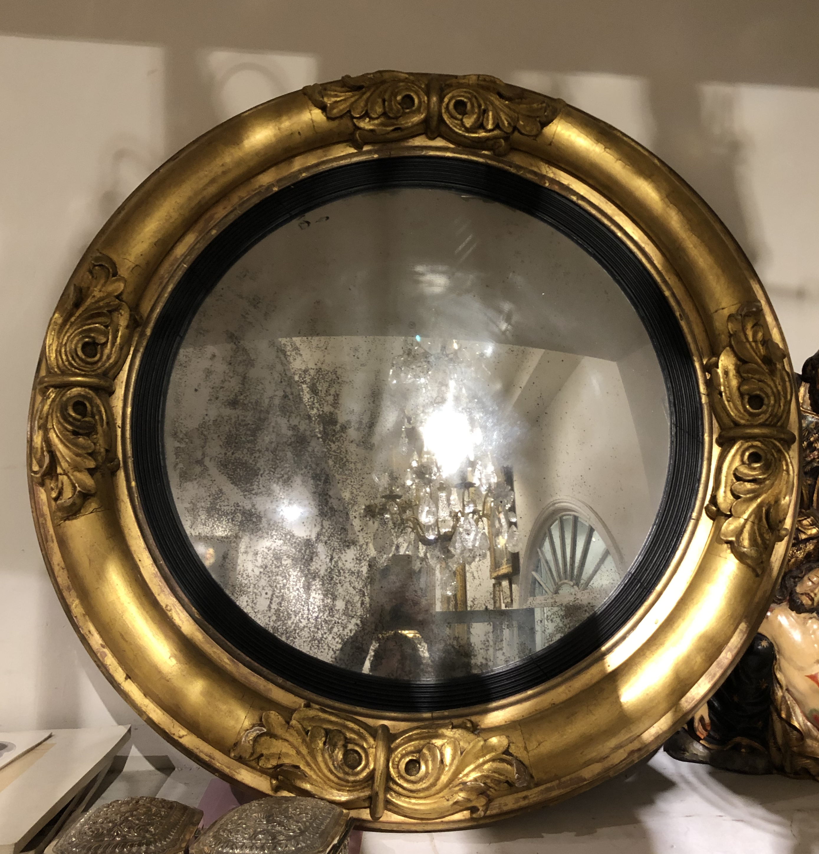 A Regency giltwood convex mirror