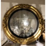 A Regency giltwood convex mirror