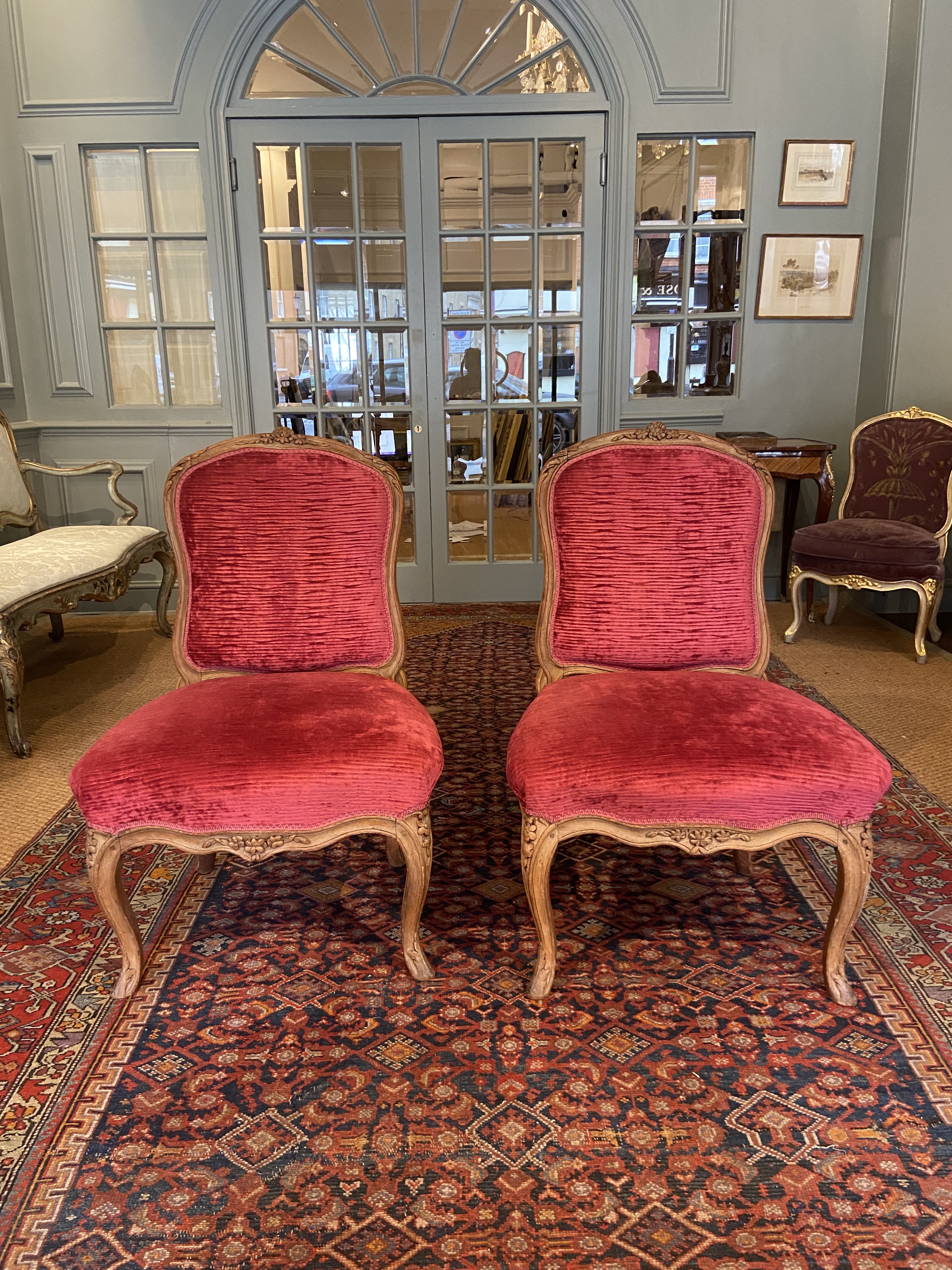 French, 18th Century, A pair of period Louis XV beechwood salon chairs