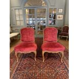 French, 18th Century, A pair of period Louis XV beechwood salon chairs