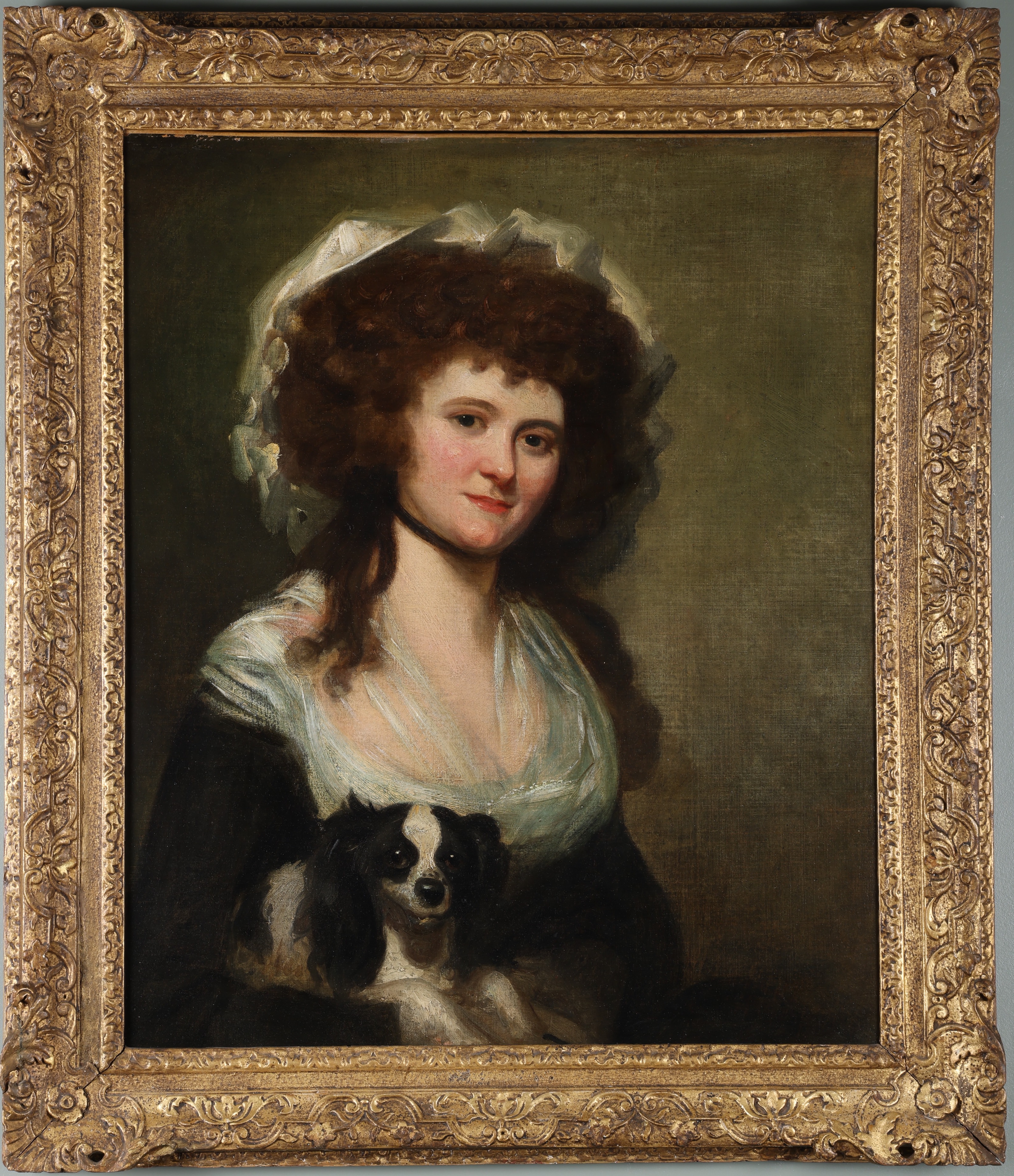 Attributed to Mather Brown (1761-1831), Portrait of a young lady with King Charles Cavalier