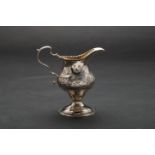 Hester Bateman, 1779, A George III silver cream-jug with gilt interior