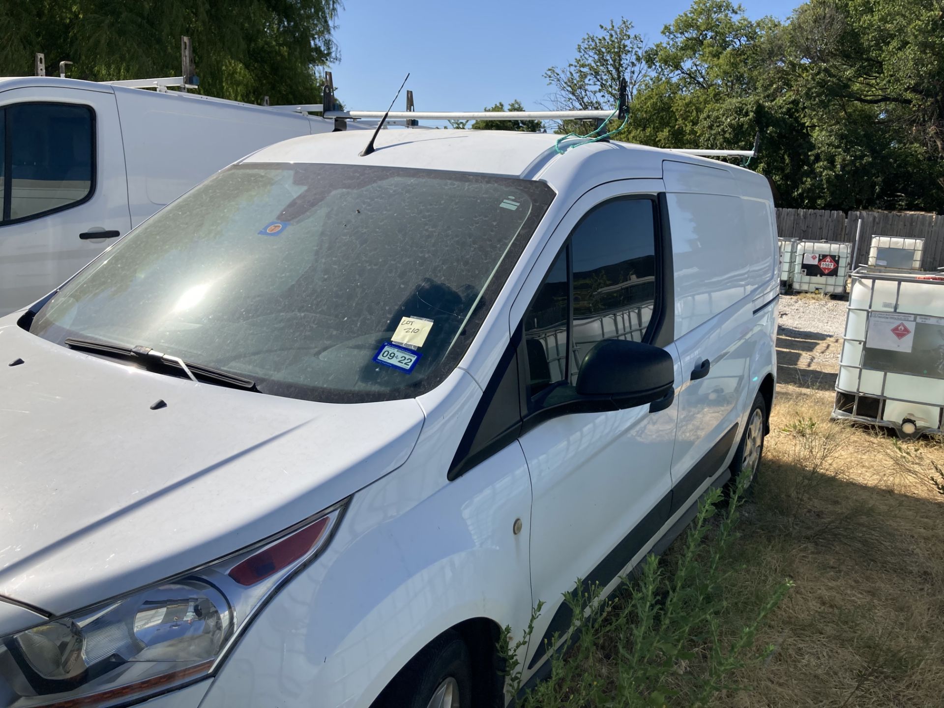 2018 Ford Transit Connect XLT, color White, with roof rack. VIN NM0LS7F73J1372848