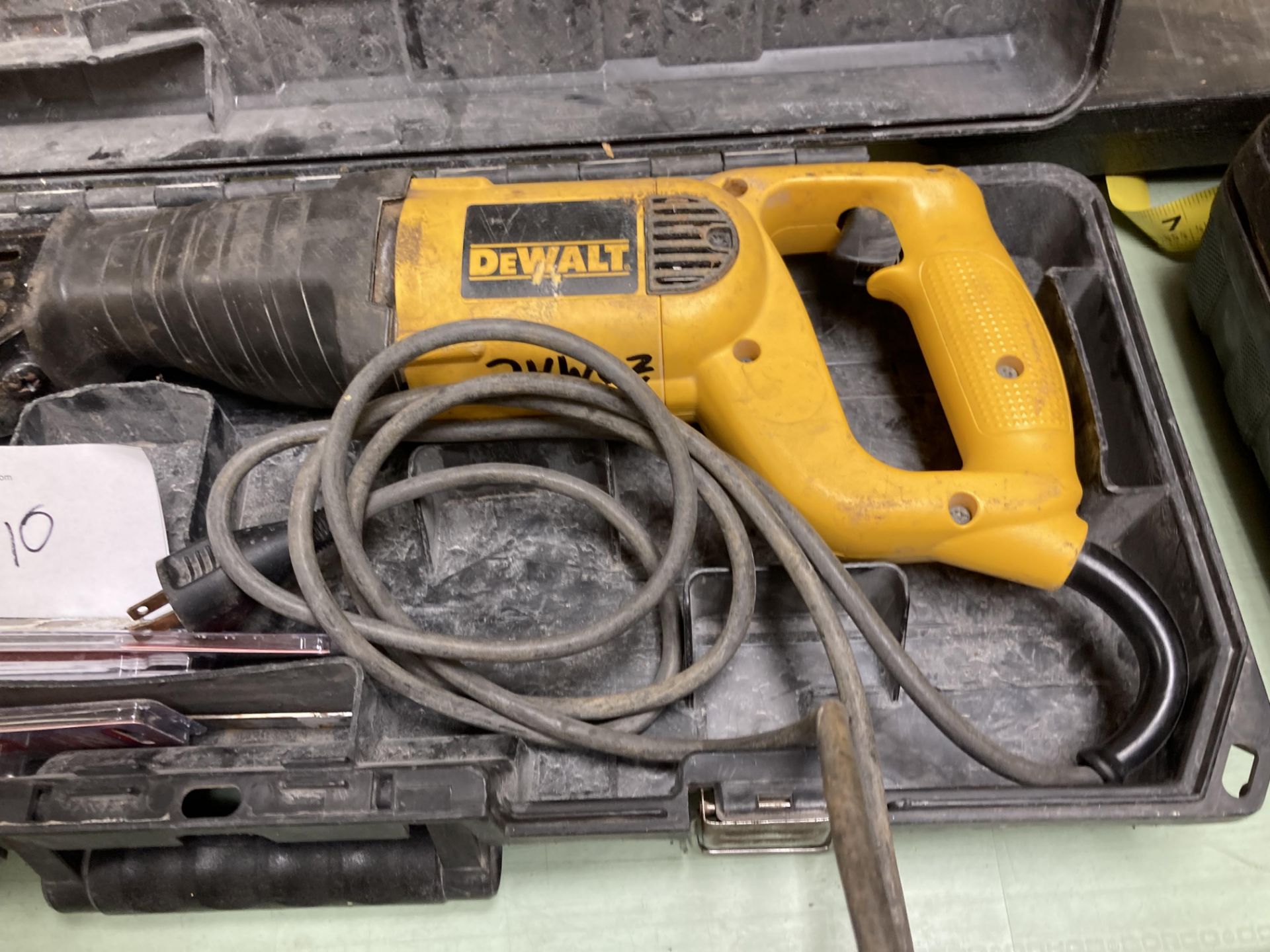 DeWalt reciprocal saw, Model DW303M, with multiple blades and case