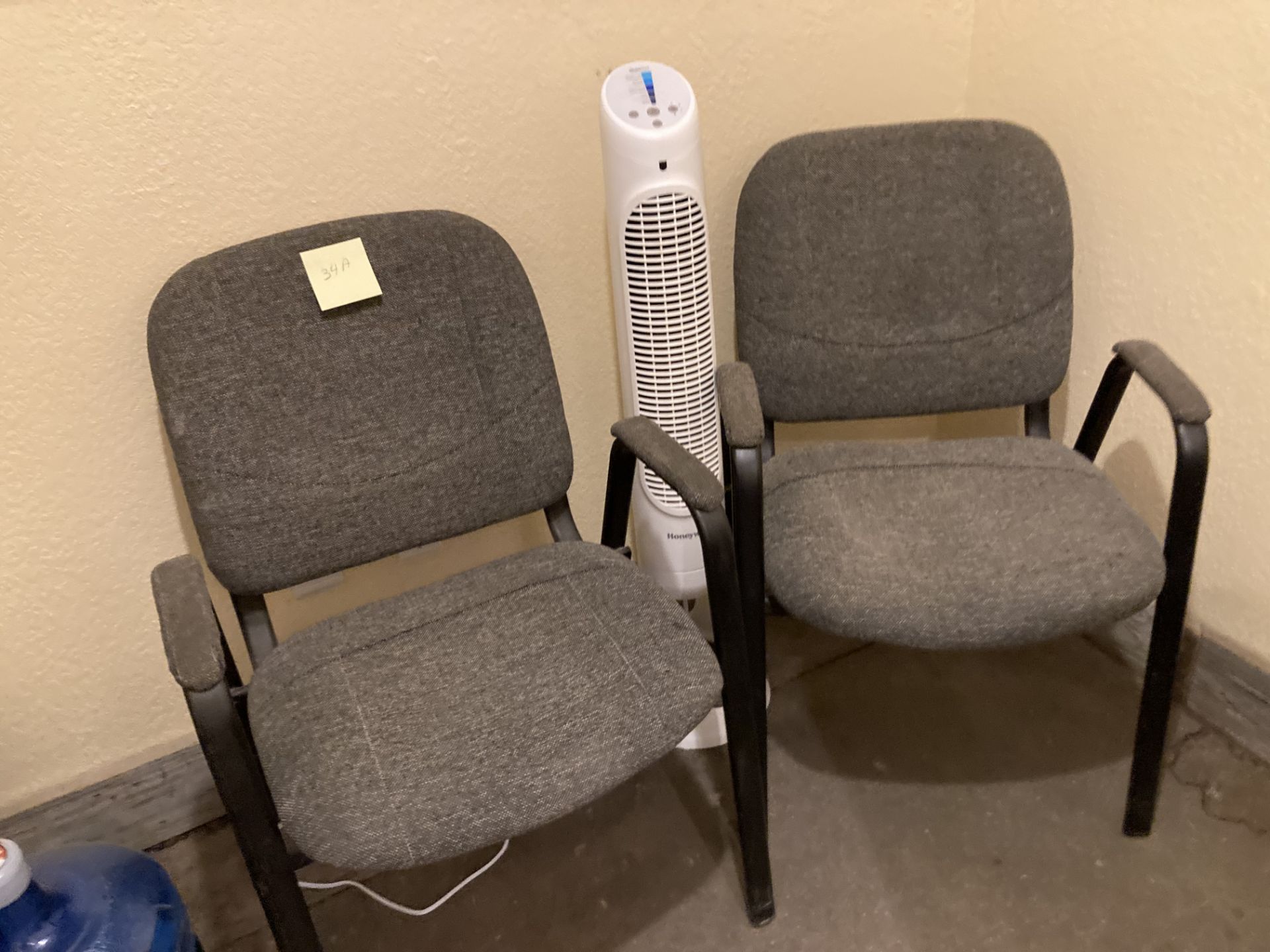 LOT OF: (2) office chairs and (1) Honeywell fan