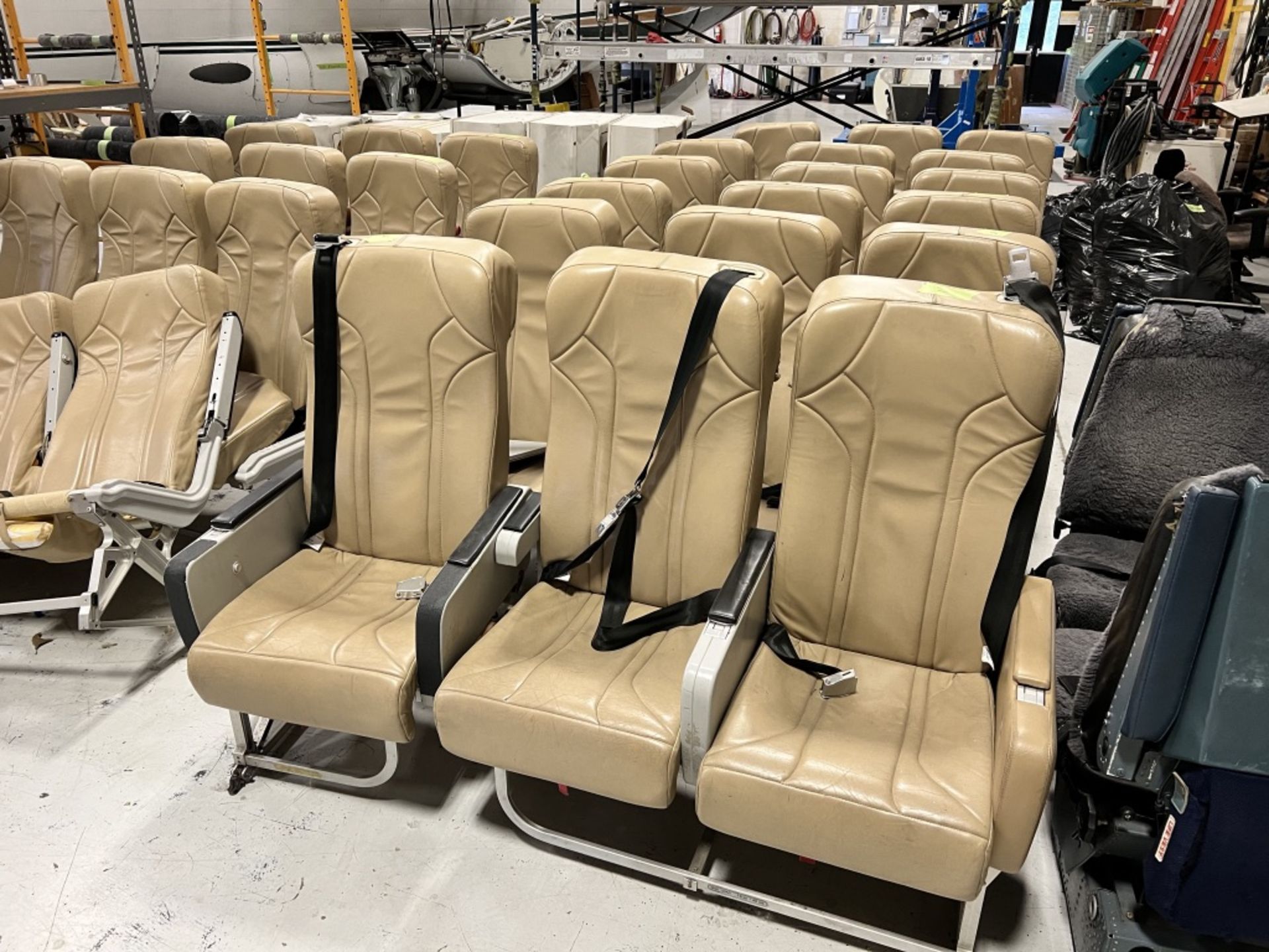 LOT OF: (30) SEATS, (1) FLIGHT ATTENDANT SEAT/ JUMP SEAT, (7) OVERHEAD LUGGAGE COMPARTMENTS AND (1)
