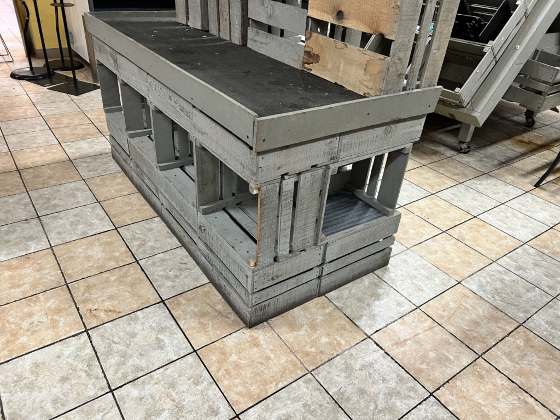 Grey wooden crate display 6’ Long X 33” Wide, X 35.5 “ Tall, w/ additional loose crates pictured.