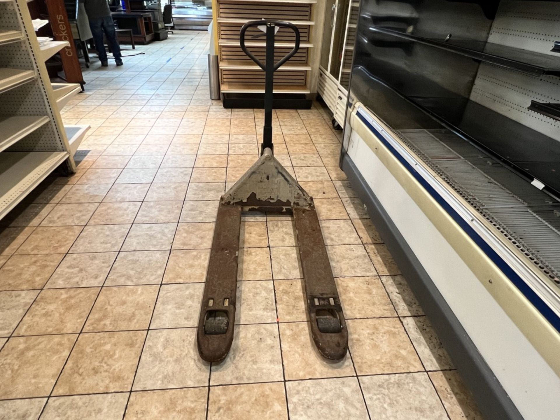 Crown Manual Pallet Jack, operational w/ signs of visible rust. - Image 5 of 9