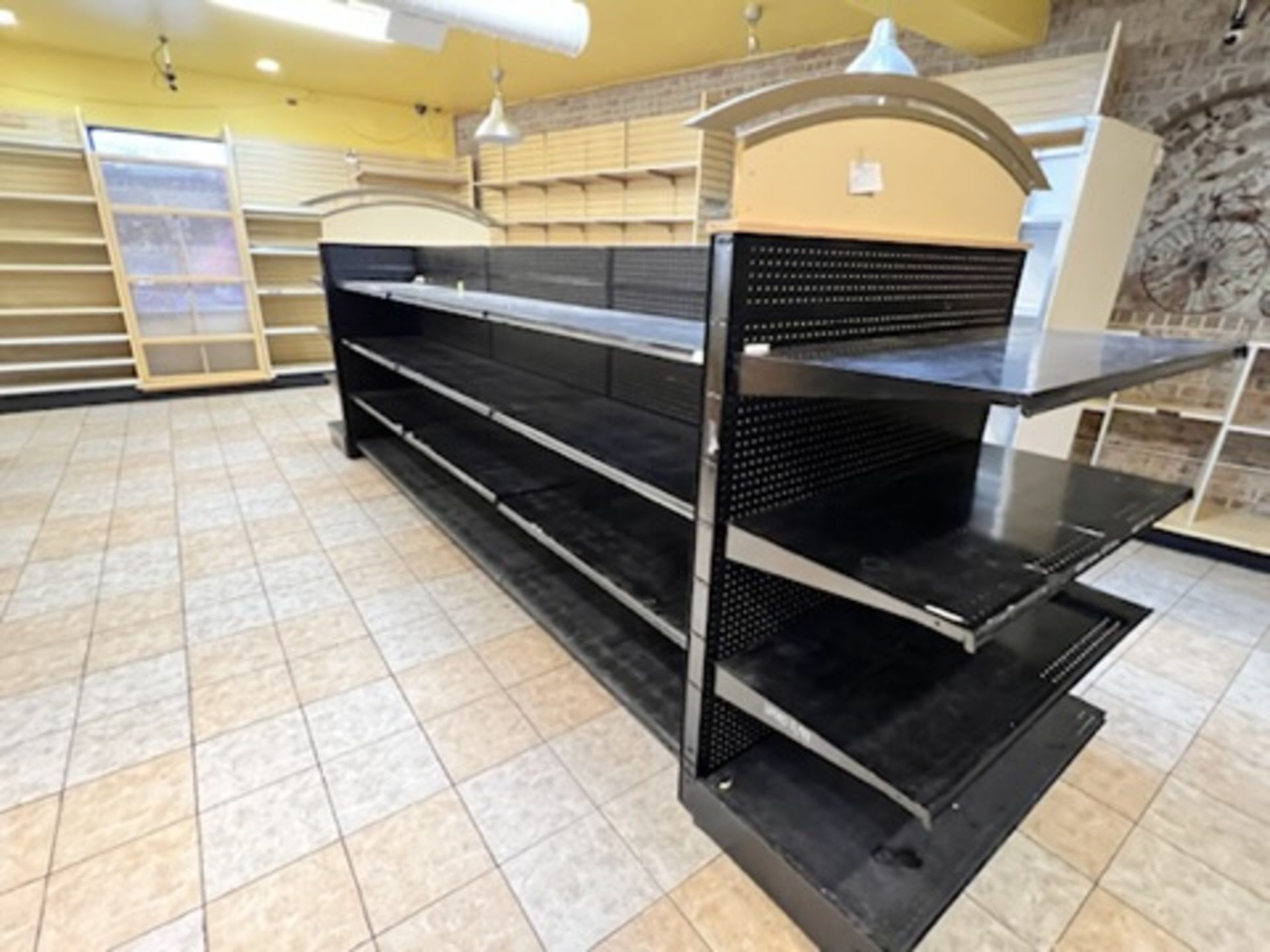 8 Section adjustable Gondola shelving system Approximately 195” Long X 50” Wide with 2 archways o - Image 3 of 12