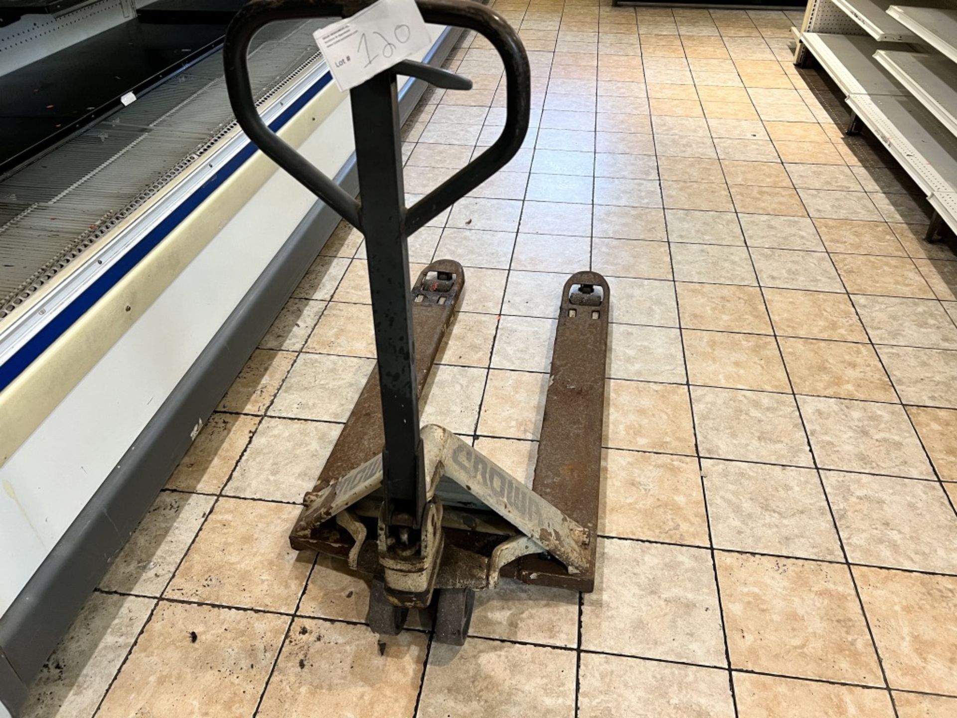 Crown Manual Pallet Jack, operational w/ signs of visible rust. - Image 7 of 9