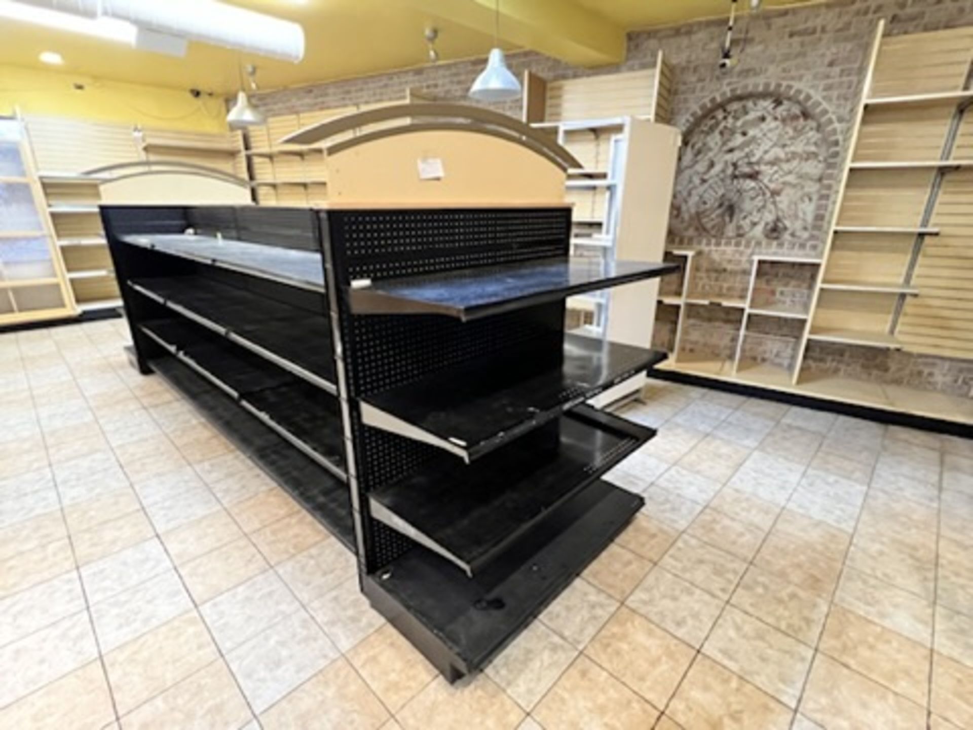 8 Section adjustable Gondola shelving system Approximately 195” Long X 50” Wide with 2 archways o - Image 2 of 12