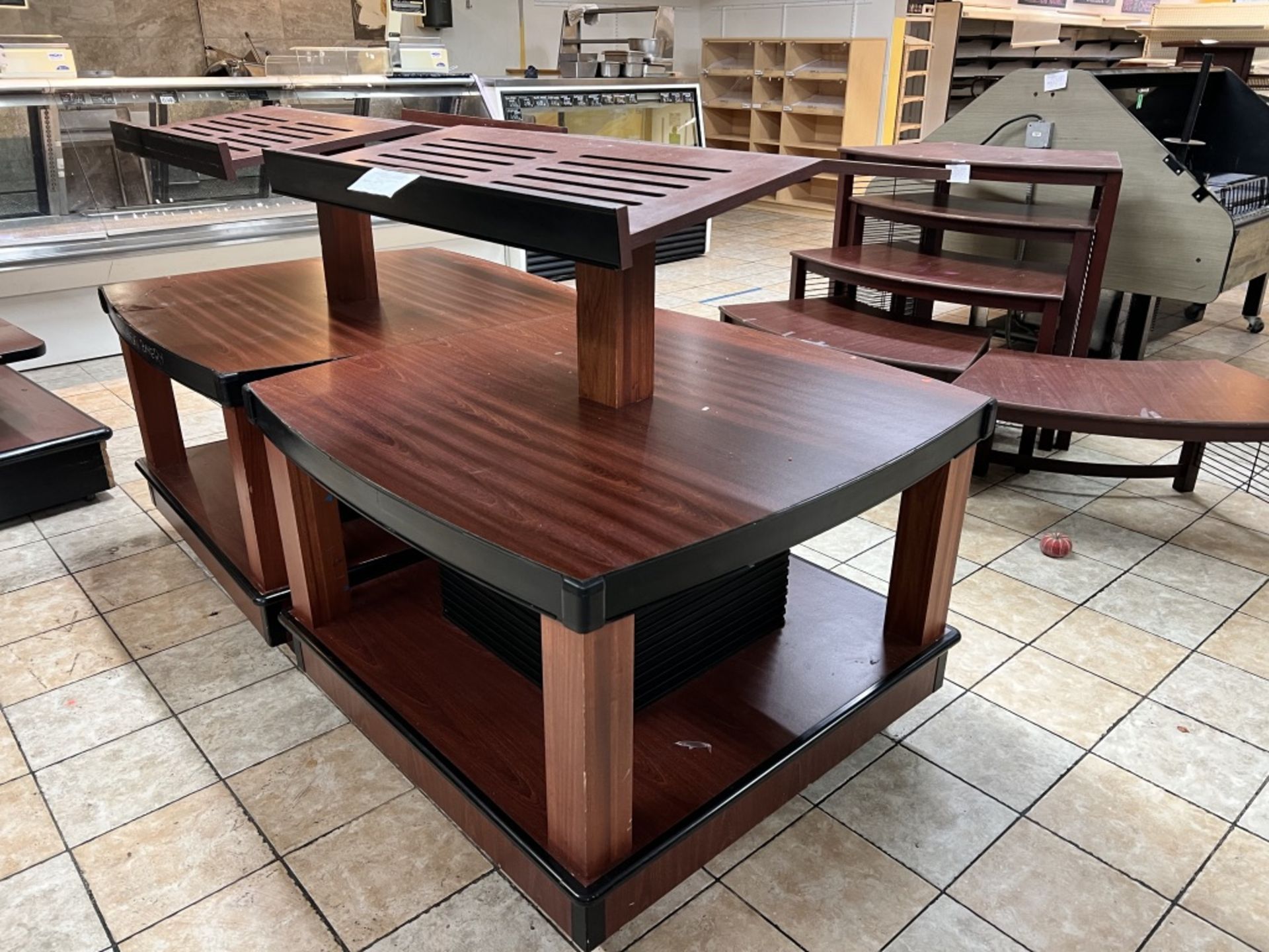 Lot of: (2) approximately 47” X 47” 2 tier wood laminate display tables w/ upper display shelving - Image 4 of 18