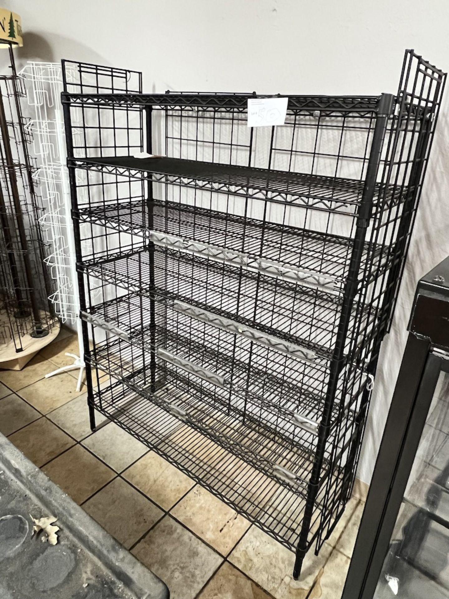 7- tier black wire shelving unit, 50” Wide X 18” Deep X 66.5” Tall