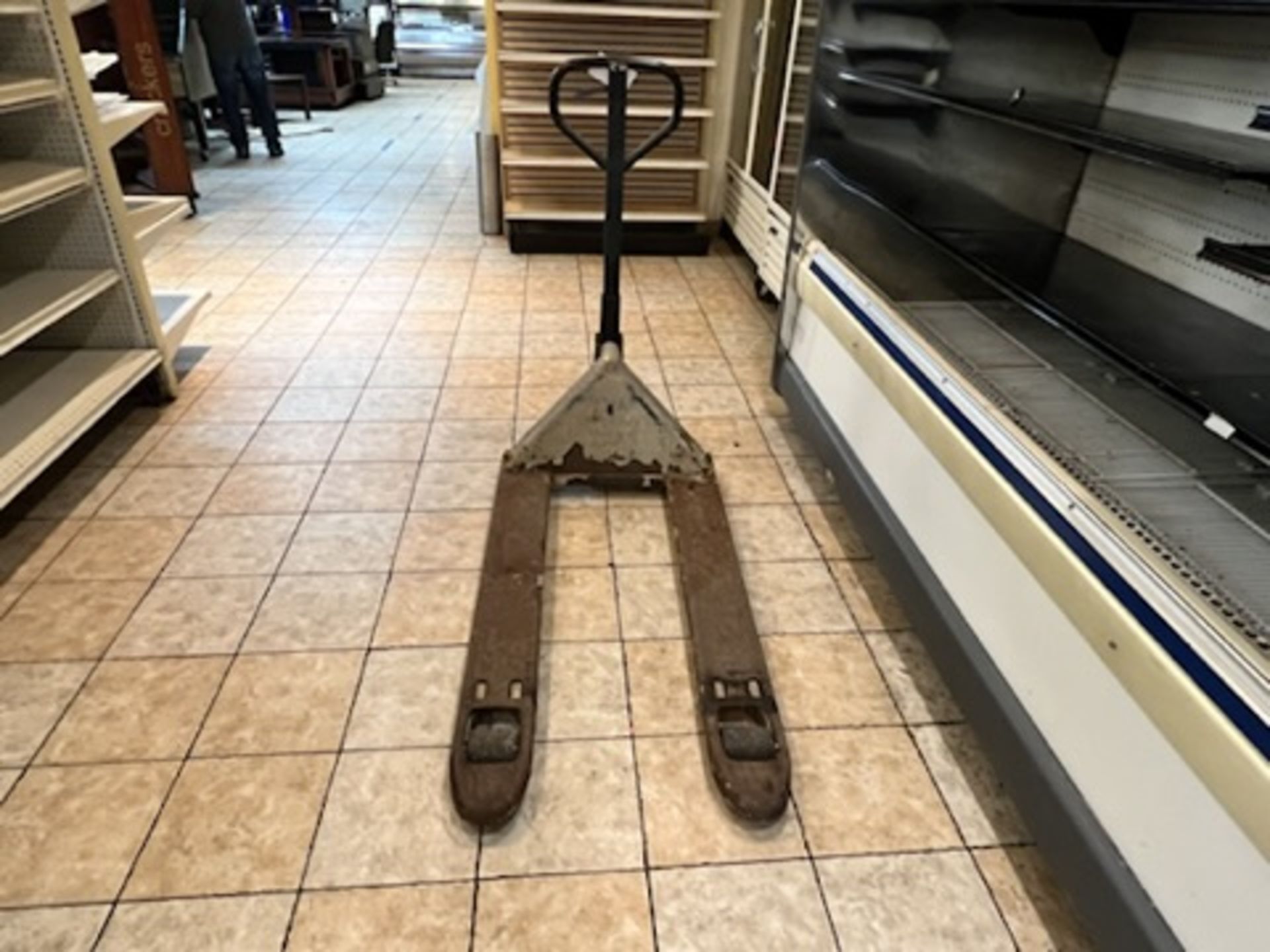 Crown Manual Pallet Jack, operational w/ signs of visible rust. - Image 6 of 9